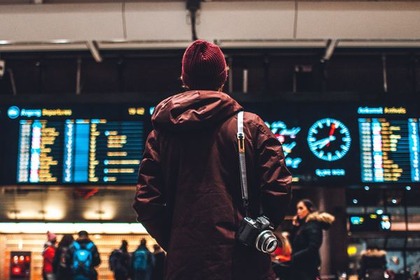 travel,explore,traveller,traveller,travel,woman,travel,plane,airplane,night,dark,station,travel,airport,man,male,photographer,camera,photography,board,timetable,creative commons images