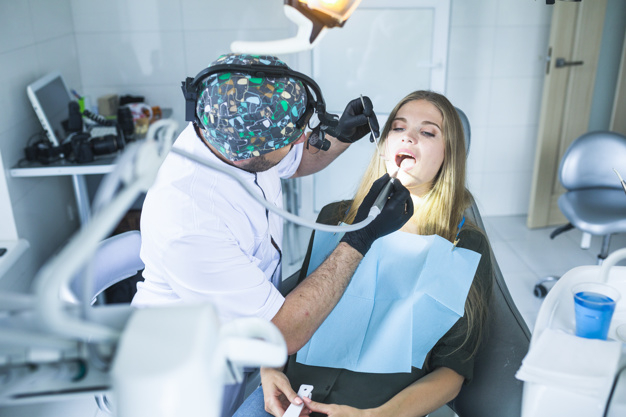 medical,light,man,doctor,hospital,human,dental,teeth,mouth,dentist,chair,tooth,clean,open,lady,healthcare,female,professional,tool,patient
