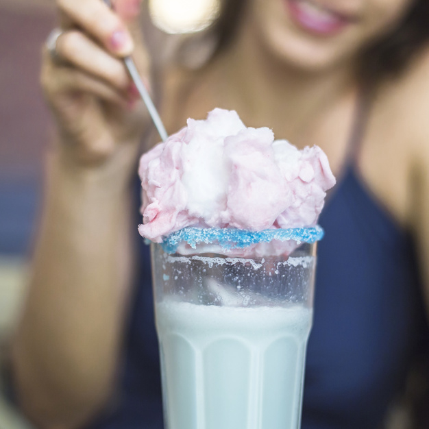 food,people,hand,restaurant,pink,ice cream,milk,human,person,ice,glass,drink,sweet,dessert,spoon,lady,cold,nutrition,cream,eating