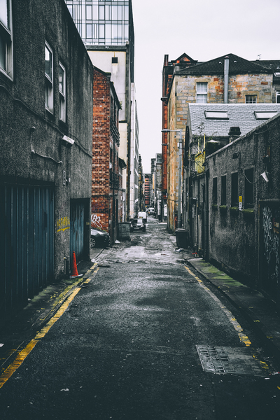 alley,architecture,buildings,cars,daylight,houses,narrow,outdoors,parked cars,pavement,photography,road,street,town,urban,vehicles,warehouse,Free Stock Photo