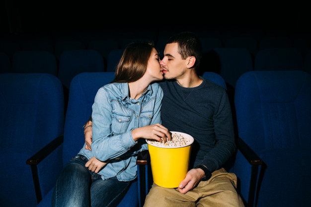 people,love,family,home,smile,cinema,film,holiday,couple,tv,movie,interior,theater,popcorn,kiss,date,romantic,picture,young,entertainment