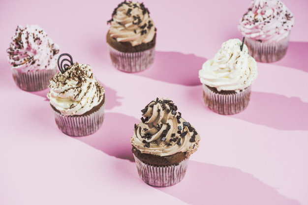 background,food,party,cake,bakery,pink,chocolate,cupcake,white,decoration,swirl,cup,sweet,dessert,cream,eating,pastry,butter,bake,delicious