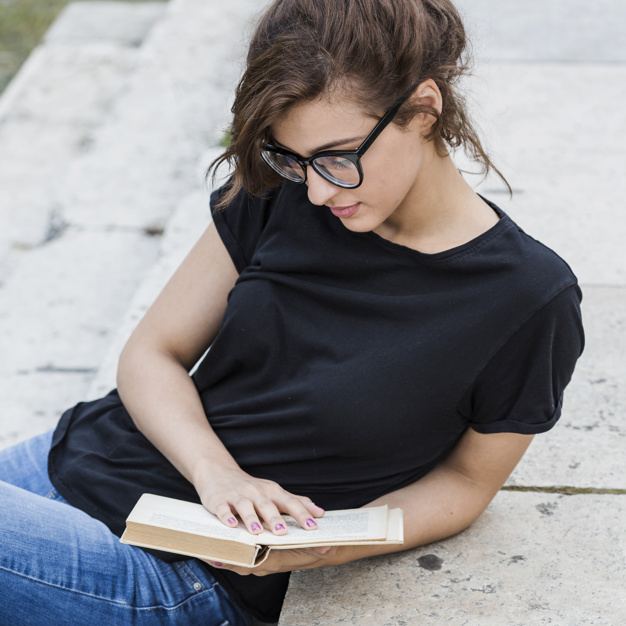 book,hand,summer,student,cute,black,shirt,holiday,clothes,square,glasses,modern,park,stone,reading,old,college,stairs,jeans,female
