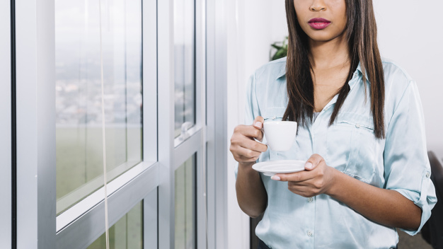 coffee,building,office,home,black,work,room,coffee cup,drink,window,cup,weather,lady,mug,workplace,business woman,african,female,young,apartment