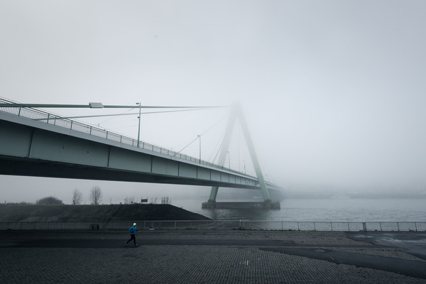 architecture,bridge,infrastructure,fog,cold,weather,road,people,man,alone,jogging,exercise,fitness,health,sea,water