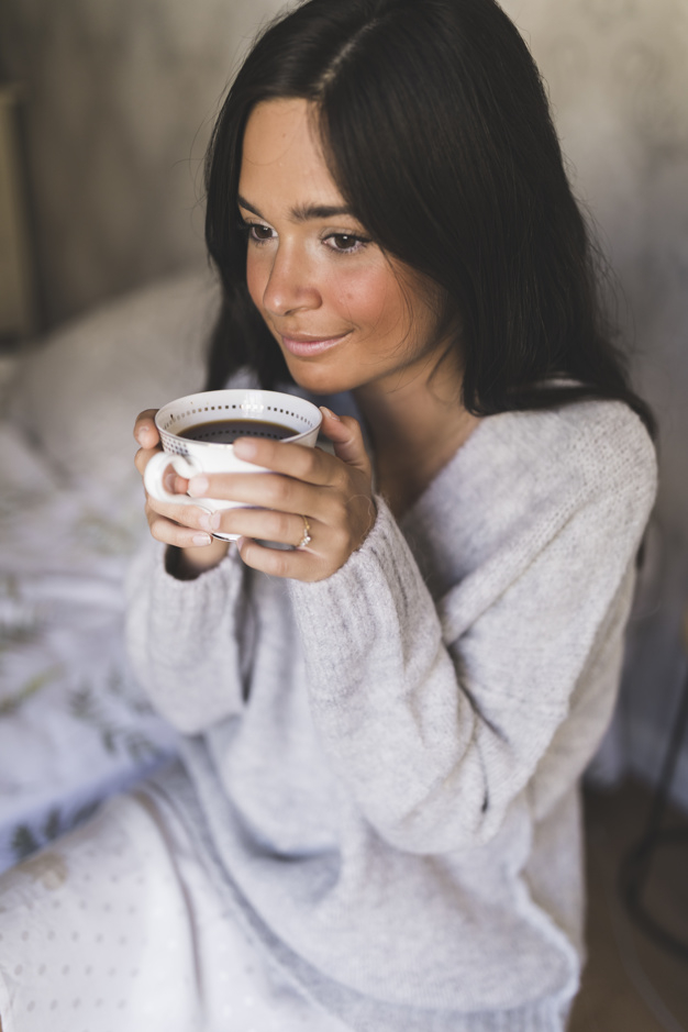 coffee,people,house,hair,home,tea,person,coffee cup,drink,cup,thinking,clothing,lady,morning,female,fresh,liquid,tea cup,sitting,portrait