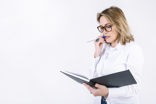 business,education,idea,space,shirt,glasses,white,notebook,pen,person,report,thinking,learning,information,reading,studio,working,research,business woman