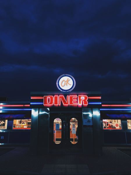 retro-cool,vintage,retro,road-tripping,sign,road,small business,shop,table,neon sign,neon,night sky,nighttime,contrast,ok diner,diner,food,dark,line,bright,light,creative commons images
