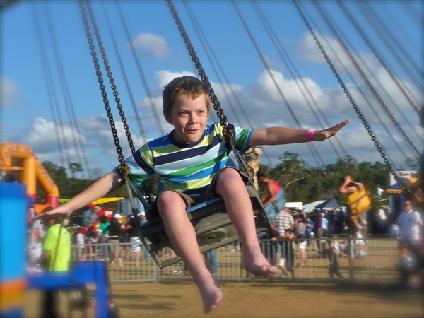 cc0,c1,child,flying,joy,outdoor,joyful,happiness,young,happy,fun,smiling,fly,air,carnival,flight,freedom,carefree,action,motion,movement,boy,gladness,energy,free photos,royalty free