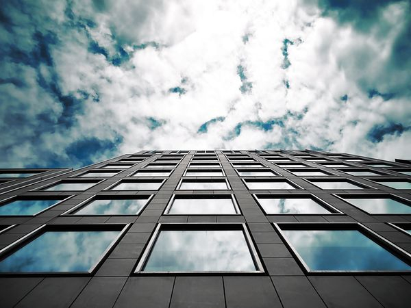 architectural design,architecture,building,business,city,cityscape,clouds,contemporary,facade,finance,futuristic,glass items,glass windows,low angle shot,modern,office,perspective,reflection,sky,skyscraper,tall,tower,urban,windows,Free Stock Photo