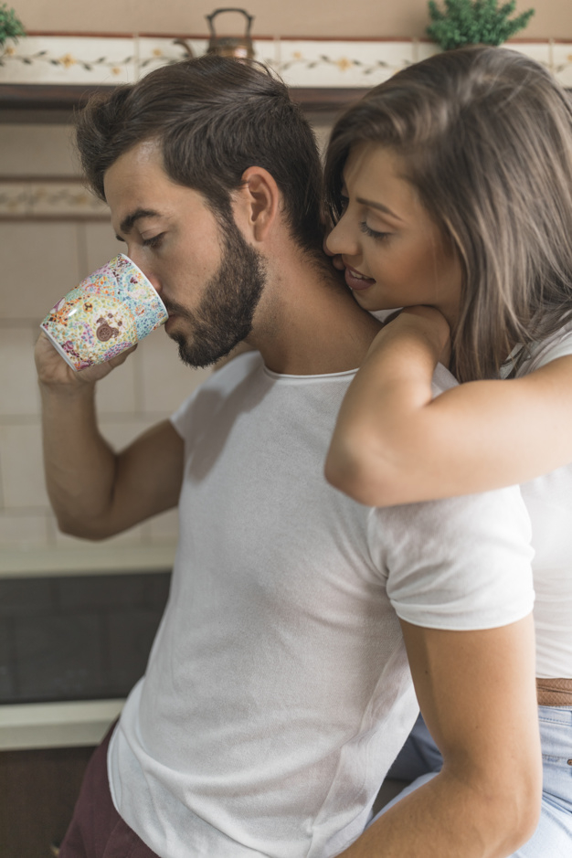 coffee,love,man,home,cute,happy,tea,couple,drink,breakfast,mug,relax,morning,care,together,young,apartment,view,beautiful,sitting