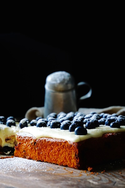 blueberries,cake,close up,dark background,dessert,sweet
