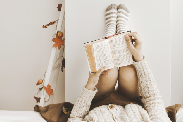 book,home,wall,glasses,bed,reading,knowledge,relax,bedroom,female,young,jacket,good,story,socks,warm,sweater,soft,hobby,blank