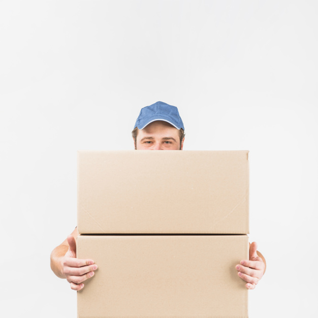 square format,looking at camera,studio shot,copy space,carrying,brunette,format,heavy,pile,casual,handsome,two,stack,standing,looking,copy,big,occupation,parcel,shot,adult,holding,beige,courier,carton,delivery man,male,cardboard,packaging box,square background,order,holding hands,background white,boxes,professional,young,post,light background,studio,cap,package,service,background blue,worker,job,mail,person,white,square,white background,delivery,space,blue,box,man,camera,light,hand,blue background,background