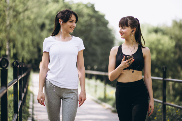 Free: Two girl walking in park after exercising - png.is