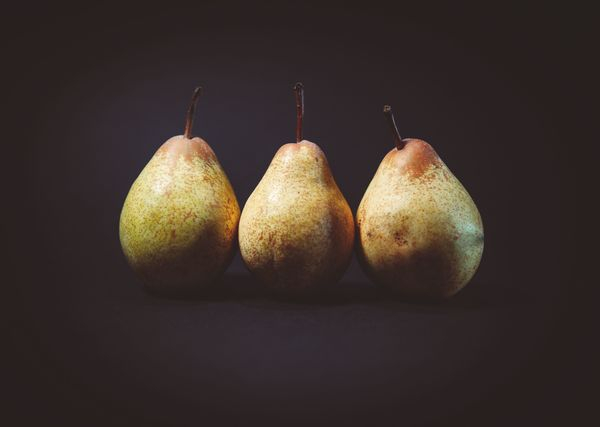 food & drink,clothes,suits,plastic,hanging,shipping,commerce,sales,produce,pome,fruit,edible fruit,pear,food,ripe,juicy,sweet,healthy,yellow,organic,diet,tasty,pears,fresh,vegetarian