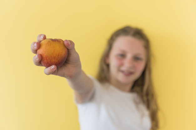 food,kids,children,camera,fruit,face,kid,child,human,apple,person,healthy,healthy food,studio,diet,nutrition,emotion,healthy lifestyle,expression,lifestyle