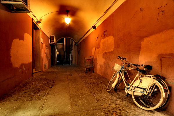 wall,travel,street,light,italy,hallway,bologna,bikes,bicycles,architecture,alley