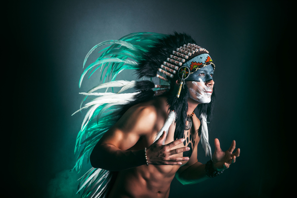 back light,dark,face paint,feathers,green,indian,male,man,model,pose,studio,Free Stock Photo