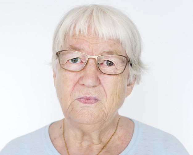 Free: Portrait of serious white elderly woman 