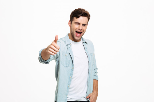 gesturing,caucasian,satisfied,attractive,casual,handsome,excited,friendly,great,standing,amazing,laughing,adult,guy,joy,male,positive,fit,thumb,achievement,happiness,smart,good,professional,young,youth,success,happy,man,fashion