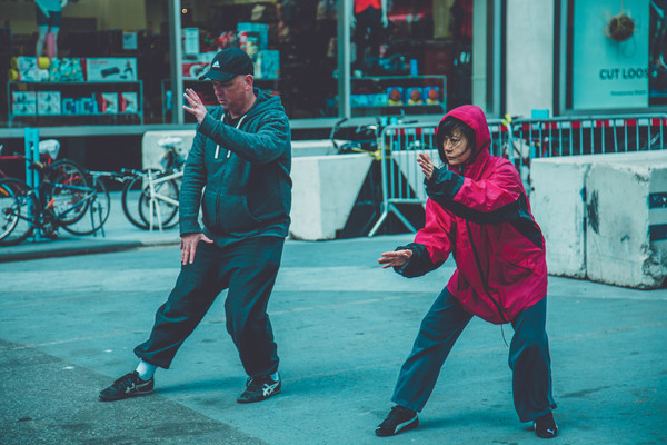 action,active,activity,adult,blur,city,exercise,fashion,fit,fitness,focus,hoodie,karate,leisure,martial arts,pavement,people,pose,posture,practice,recreation,street,wear
