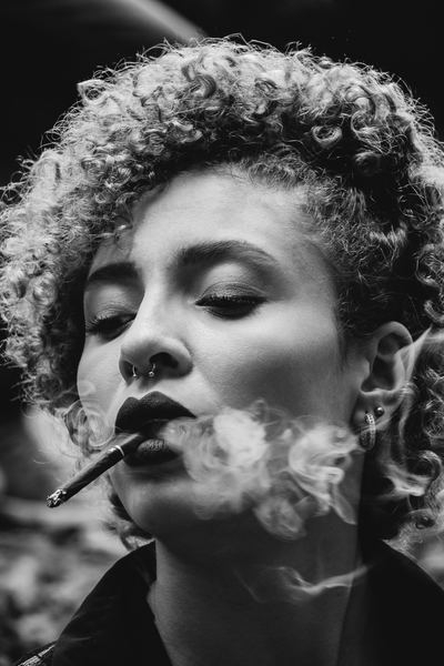 raw,man,male,portrait,fashion,woman,persona,woman,black and white,woman,female,curly hair,piercing,face,portrait,model,black and white,smoking,smoke,cigarette,cigar,creative commons images