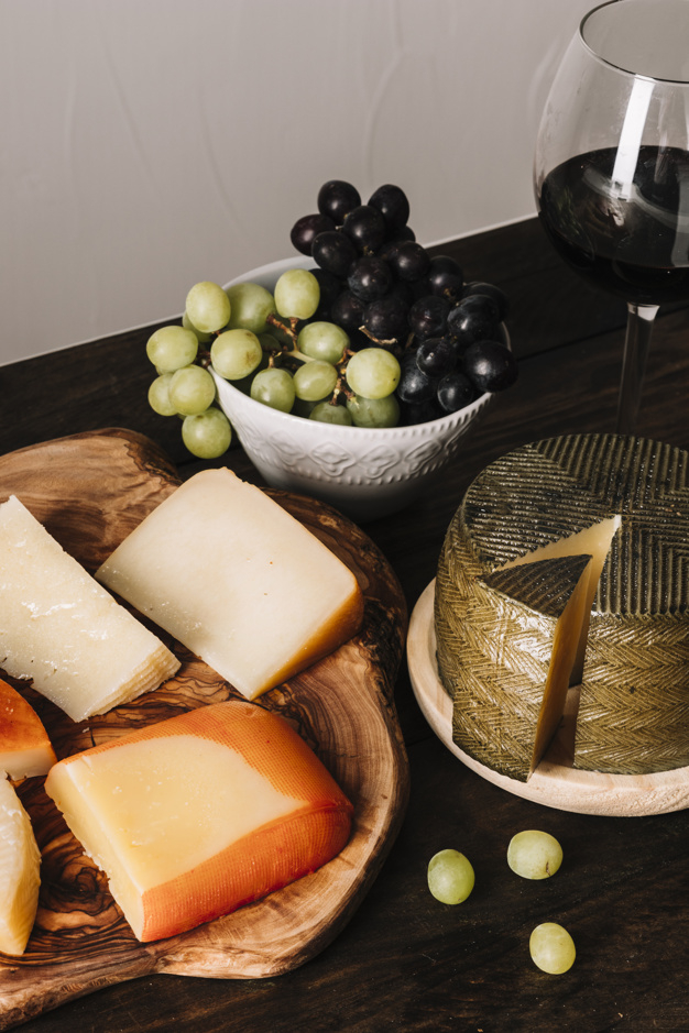 food,table,red,wine,fruit,space,celebration,board,glass,drink,plate,cheese,dinner,life,wooden,alcohol,grapes,lunch,culture,wood table
