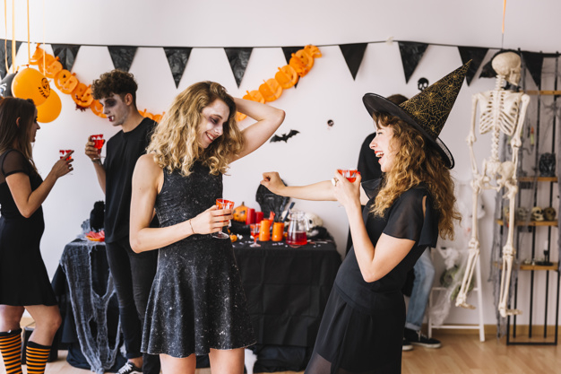 party,halloween,red,autumn,space,celebration,orange,black,decoration,glass,drink,fall,teenager,pumpkin,zombie,young,witch,skeleton,masquerade,season