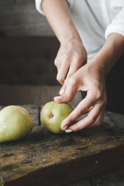 cutting,fresh,fruit,hands,pear,process