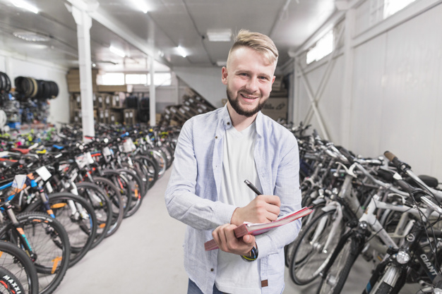 business,people,travel,man,smile,happy,shop,bike,metal,human,bicycle,person,business people,store,business man,transport,document,wheel,writing