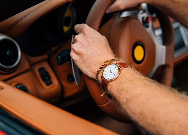  car,watch,ferrari,luxury car,brown leather,paddle shifts, steering wheel