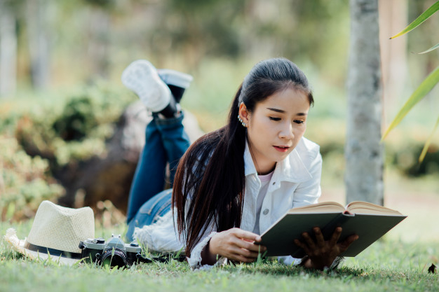 middle,aged,brunette,outside,relaxing,leisure,smiling,adult,literature,beauty woman,cute girl,read,lifestyle,portrait,sitting,beautiful,view,happy people,young,female,outdoor,reading,sunset,park,person,glasses,women,happy,black,books,grass,cute,forest,autumn,student,girl,nature,green,woman,education,summer,book,people,tree