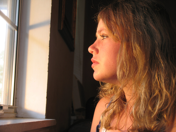 girl,teen,woman,teenager,window,sunlight,sun,serious,stare,youth,young,profile,contemplate,watch,gaze,portrait,horizontal,stress,worry,problem,depressed,staring,girls,women,teenagers,person,people,profiles,troubled,thoughtful,thoughts,thinking
