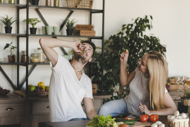 people,house,man,kitchen,hair,home,beauty,smile,happy,couple,plant,tomato,eating,female,young,happy people,beautiful,sitting,focus,beauty woman