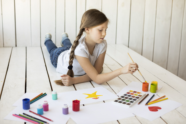one,innocence,indoors,lying,hardwood,multicolored,little,casual,hold,childhood,artwork,hobby,artistic,painter,artist,female,craft,draw,paintbrush,creativity,floor,painting,drawing,creative,bottle,person,white,pencil,colorful,kid,wall,color,art,cute,brush,home,paint,girl,paper,wood,people,watercolor