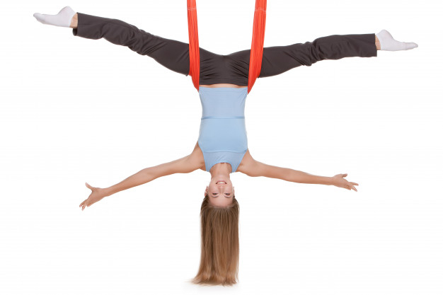 Free: Young woman making antigravity yoga exercises in stretching twine  Free Photo 