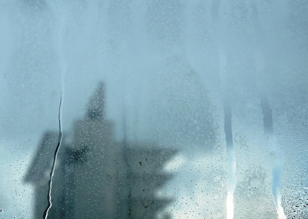 abstract,window,glass,rain,drops,raindrop,drip,condensation,steamed up,misted,tower,skyscraper,building,construction,structure,high rise,architecture,blue,background,weather,urban,city,inside,season,winter,cold,backdrop,skyline,surface,sky