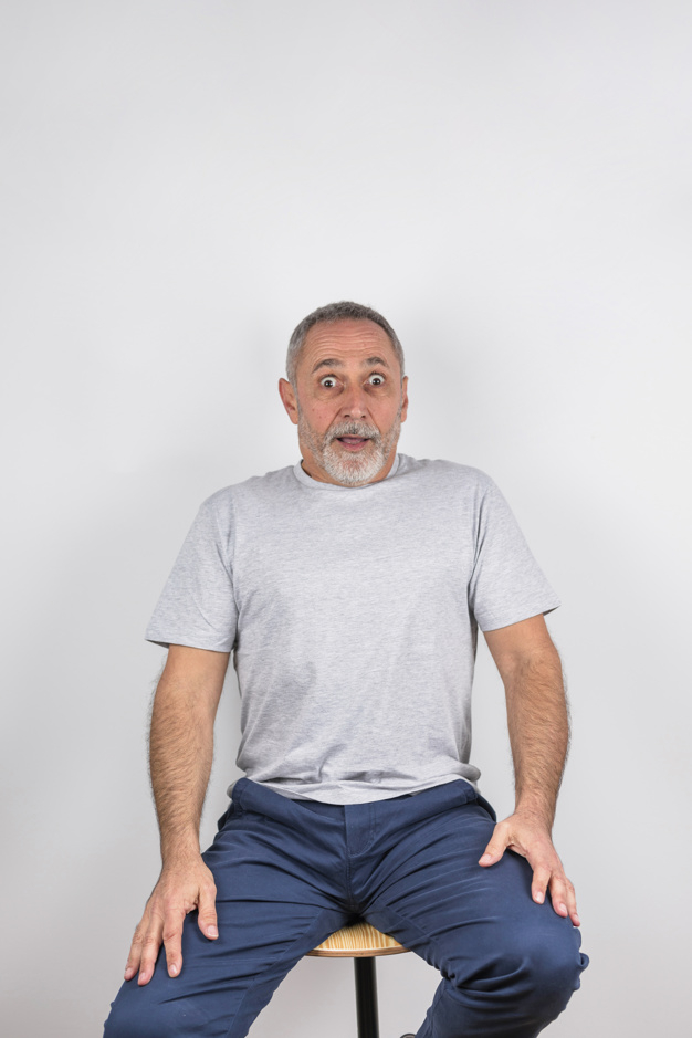 background,camera,man,space,furniture,creative,grey background,smiley,chair,tshirt,fun,funny,old,grey,cloth,jeans,old man,happiness,sitting,material,creative background,elderly,positive,male,joy,senior,surprised,copy,looking,wear,stool,casual,pleasure,aged,amazed,bearded,at,copy space,looking at camera