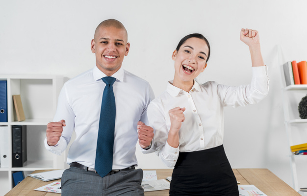 overjoyed,indoors,joyful,confident,cheerful,excited,front,two,standing,looking,smiling,formal,adult,businesswoman,successful,executive,male,american,portrait,happiness,asian,manager,professional,young,together,female,career,african,workplace,lady,open,tie,employee,mouth,worker,desk,success,job,businessman,couple,happy,smile,beauty,table,office,man,woman,people,business