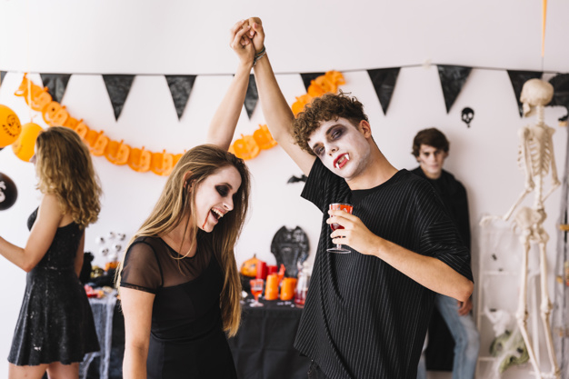 party,halloween,hands,red,autumn,space,celebration,orange,black,couple,decoration,glass,drink,fall,blood,teenager,pumpkin,date,zombie,young