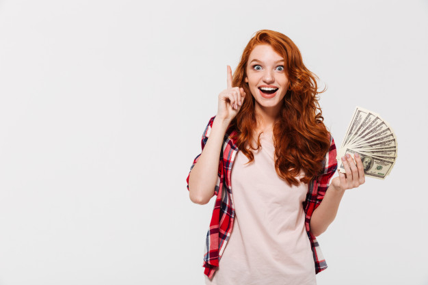 pleased,20s,caucasian,charming,purchases,redhead,posing,attractive,cheerful,inside,casual,single,indoor,looking,pretty,surprised,adult,alone,holding,ginger,lovely,portrait,beautiful,young,talking,female,youth,person,smartphone,happy,cute,hands,phone,woman,money,people