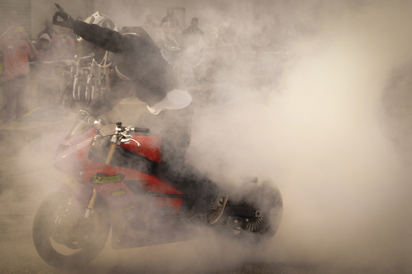 burnout,dangerous,dust,helmet,man,motor racing,motorbike,motorcycle,person,sport,stunt,Free Stock Photo