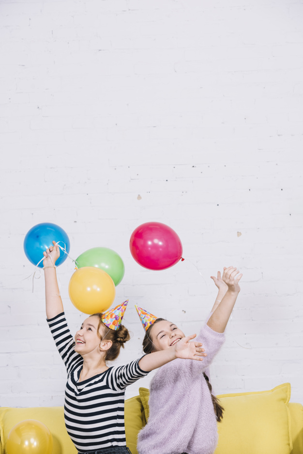 background,birthday,people,party,green,blue,hands,pink,home,celebration,wall,colorful,balloon,event,white,yellow,backdrop,colorful background,hat,balloons