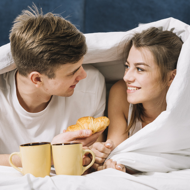 coffee,love,man,home,valentine,happy,room,square,couple,coffee cup,drink,cup,breakfast,sweet,bed,mug,morning,romantic,together,young