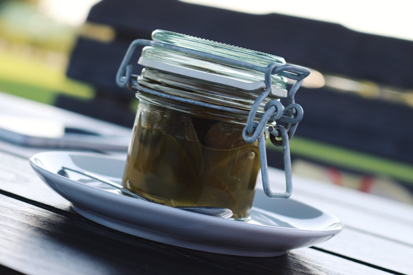 jalapenos,pickled,glass,jar,plate,table