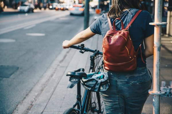  bike,city,helmet,backpack,sidewalk, pedestrian