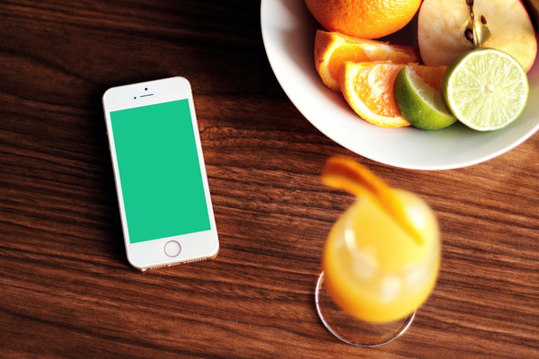 iphone,mockup,cell phone,mobile,apple,technology,orange juice,glass,mimosa,fruits,limes,apples,bowl,table