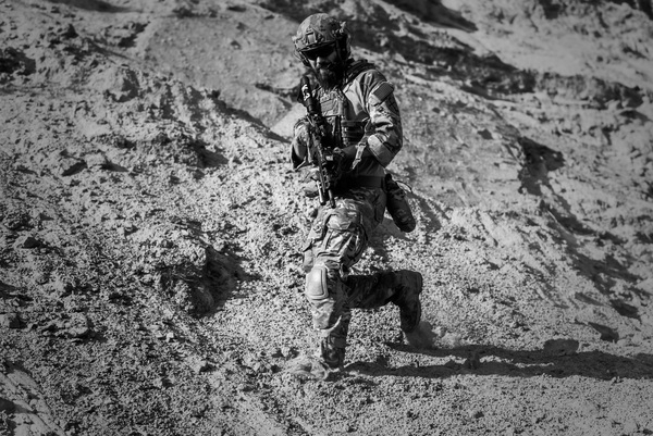 weapon,uniform,soldier,sand,person,military,man,gun,desert,combat,black-and-white,army,activity,active,action