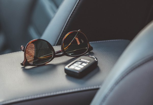  car,sunglasses, personal items
